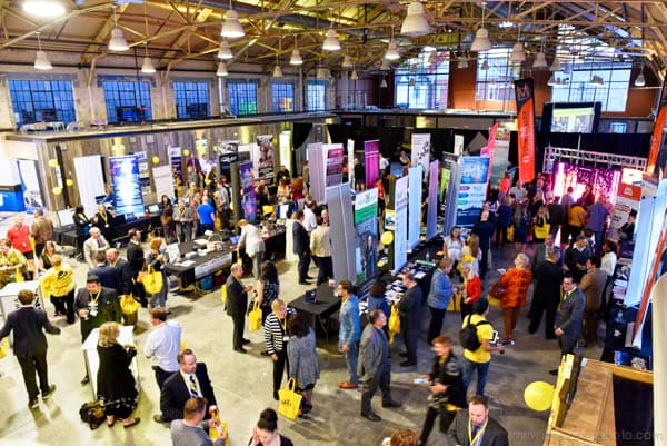 Entrepreneurs networking on the eSAX tradeshow floor
